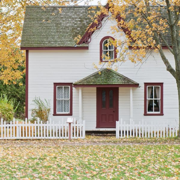 house with a fence surrounding the property